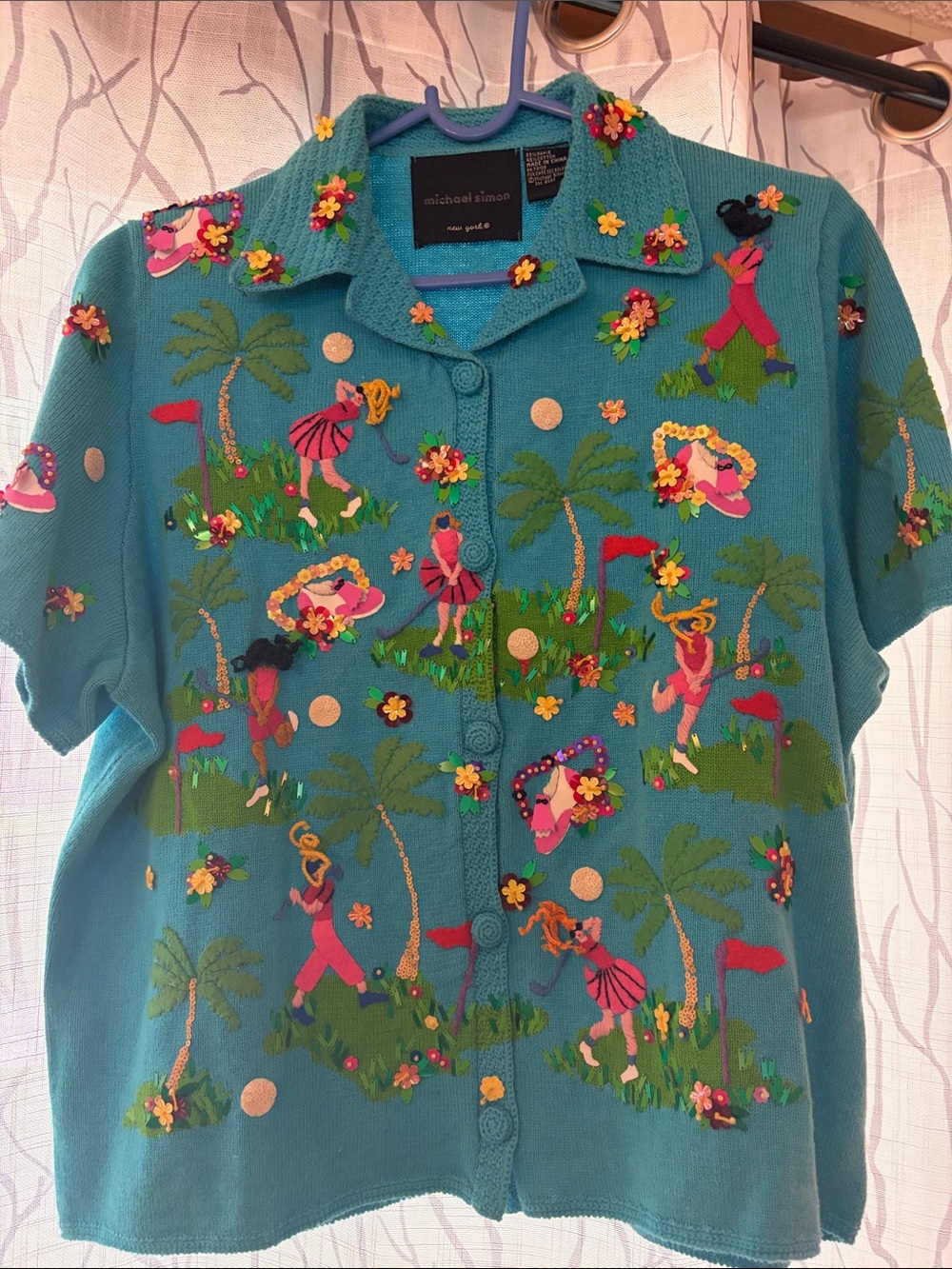 Michael Simon Women’s Teal Embroidered Tropical Golf Shirt